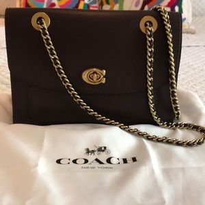 Chain handbag with brass hardware